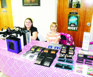 Grade 5 students Bella Masut and Olivia Young had a display of bags and wallets they made.