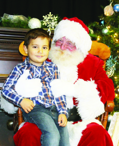 The gym and halls at Caledon East Public School were busy places last Saturday as the school hosted its annual Craft Show. Santa Claus was on hand to meet his many friends, like junior kindergarten student Emre Tumer.