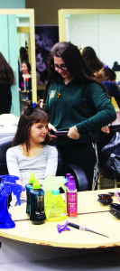 Not all future Hall students got this treatment, but Athena Macini got some work done on her hair in the cosmetology room by Grade 10 student Dimitra Pasceri.