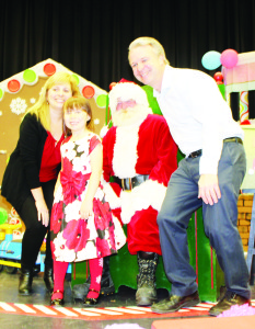 HERB CAMPBELL HOSTS SANTA Saturday was the time for the annual Breakfast with Santa at Herb Campbell Public School. the gust of honour got the chance to meet many of his friends, including Grade 2 student Alexandra Fannon, who was accompanied by her parents Nancy and Ted. Photo by Bill Rea