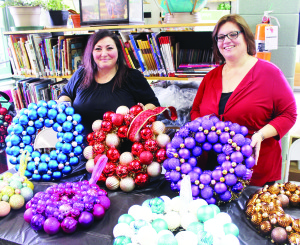 Christmas Marketplace at St. Cornelius The halls and gym at St. Cornelius Elementary School was packed recently with vendors selling their creations and groups offering information. The event was the annual Christmas Marketplace. Domenica Spadafora and Diana DiPlacido of Creative Balls in Maple had a number of colourful wreaths to sell. Photos by Bill Rea
