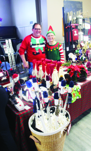 CHRISTMAS IN CALEDON VILLAGE Caledon Village Place was packed recently with display tables and shoppers looking them all over. The event was Christmas in Caledon Village, put on by the Caledon Agricultural Society. Paul and Tricia Richea from Bolton had a display of Winterland Treasures. Photo by Bill Rea