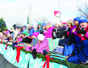 The Girl Guides of Bolton were well represented by this group riding on their float.