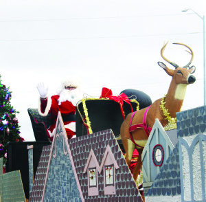 It was a bright, sunny day Saturday; perfect weather to get out and greet Santa Claus as he made his return to Bolton in the annual Santa Claus Parade. The crowds gathered at the side of Queen Street in Bolton Saturday to greet him as he made his triumphant return. 