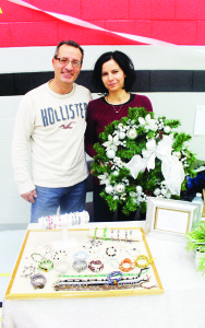 Domenic Ierullo of Bolton was showing some of the hand-made jewelry he made while his wife Gemma had created an assortment of wreaths.