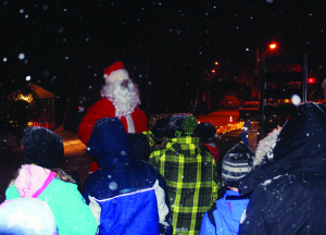 Santa Claus was out too, joining revellers on hay rides through the streets of the village. Photos by Bill Rea