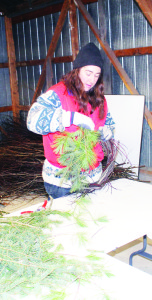 WREATH MAKING MADE EASY Mount Wolfe Forest Farm hosted the public Saturday at their Old Church Road location. Farm Manager Sarah Dolamore was putting on demonstrations on how to make holiday wreaths using natural materials. Photo by Bill Rea