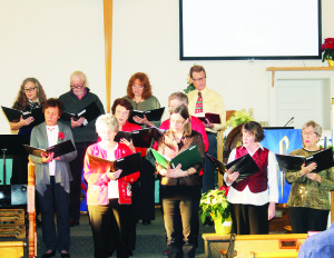 CAROLS SUNG AT CALEDON EAST The Choir at Caledon East United Church were front and centre Sunday. They were performing in the Church's Christmas Concert and Carol Sing. Photo by Bill Rea