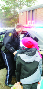 Constable Greg Page was helping Caledon East Public School students load up this cruiser.