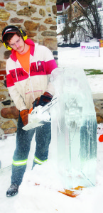 Jim Menken of Mono and his son Cam were among those demonstrating their skills at ice carving.