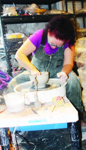 Potter Ann Randeraad had an audience in her studio to watch her at work.