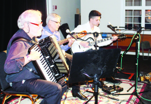 LATIN NIGHT AT CROSSCURRENTS Steve Slutsky joined Manuel Boado and his son Kevin Friday night to provide Latin theme of music. They were performing at Crosscurrents Cafe, operating out of Bolton United Church. Photo by Bill Rea