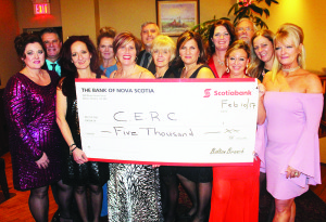 CERC HOLDS ANNUAL GALA It was an elegant scene at the Royal Ambassador Friday night as the Caledon East Revitalization Committee held their seventh annual Gala. The committee received lots of support for their effort, including from the Scotiabank branches in Bolton, Orangeville and Brampton. Representatives were on hand with this contribution for $5,000. Seen here are committee members Cheryl Robb; Chris Merkley; Adriana Roche; Jacqui Viaene; Mollie Cavan; Frank Macellaio, Sharon Savini and Rosa Evangelista of Scotiabank; Andrea Prieur; Terri Boorne; Pete Paterson, Ann Currie and Sherrie Kirkpatrick. Photo by Bill Rea