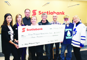 BOOST FOR MILLPOND REHABILITATION The weather might not have been ideal for the recent Alton Millpond Hockey Classic at Alton Mill, but the results were still pretty good. Mill co-owner Jeremy Grant said $10,000 was raised and another $3,000 was contributed by the Scotiabank branch in Orangeville to the Alton Millpond Rehabilitation Project. On hand for the recent cheque presentation were Brittney Ventura, Christine Ciurleo, Dirk Kuemmling and Valerie Borden of Scotiabank, Grant, Randy Ugolini of the Mill Pond Association and event committee members Steve Hayward and Beth Staite. Photo by Bill Rea
