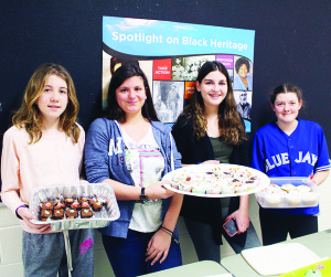 Fundraiser for SPCA Last Monday was National Cupcake Day, and the Character Crew at Allan Drive Middle School marked the day by selling cupcakes. Proceeds from the sales amounted to about $750, which was to go to the Ontario Society for the Prevention of Cruelty to Animals. Students Victoria Darlow, Melissa Barone, Leah Cammisuli and Rebecca McConnell were in charge of one of the sales tables. Grade 8 students Paige Bennitz and Anna Burda was showing off some of the inventory. Photos by Bill Rea