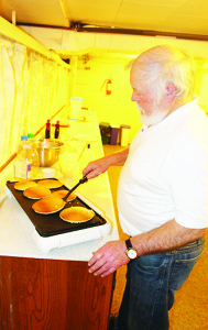 Stan Webb was hard at work at the grill at the supper at Mono Mills United Church.