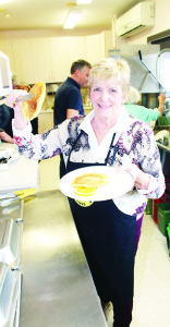 Caledon Seniors' Centre in Bolton hosted a pancake lunch. Centre member Karen Francis was helping with the serving.