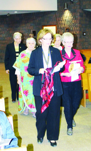 WORLD DAY OF PRAYER MARKED IN CALEDON Friday was World Day of Prayer, and there were services at Holy Family Church in Bolton and St. John Albion Church on The Gore Road. Women participating in each service progressed up the isles. This year's service was written by the World Day of Prayer Committee of the Philippines. Photos by Bill Rea