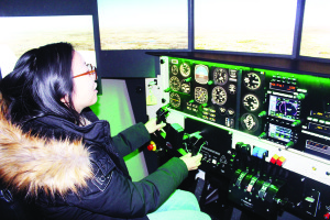 WOMEN LEARN ABOUT FLIGHT AT BFC Last week was Women in Aviation Week, and Brampton Flight Centre marked the occasion by giving women and girls interested in flight the chance to see what it's like. Toronto resident Jenny Yin, who works for a software company that provides equipment for aircraft, was trying her hand at a simulator. Photo by Bill Rea