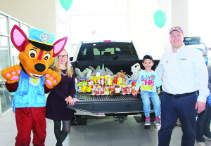 Many out to meet the Paw Patrol The showroom at Fines Ford Lincoln was packed Saturday morning, and not with cars. A large crowd of children and their parents were on hand to meet characters from Paw Patrol. The event was also aimed at collecting contributions to the Food Bank run by Caledon Community Services. Henry Martins, 4, was standing by the contributions, joined by Chase, his mother Katie Fines and his father, Fines Ford General Manager Carlos Martins. Photos by Bill Rea